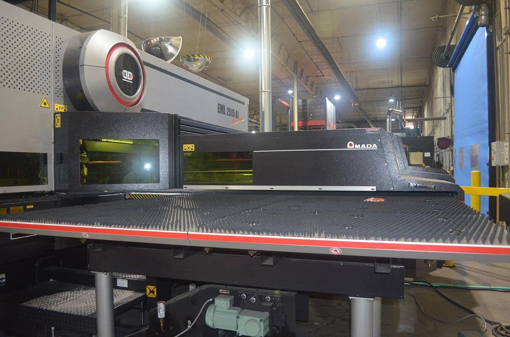 The AMADA EML 2515 AJ punch-laser machine is shown.