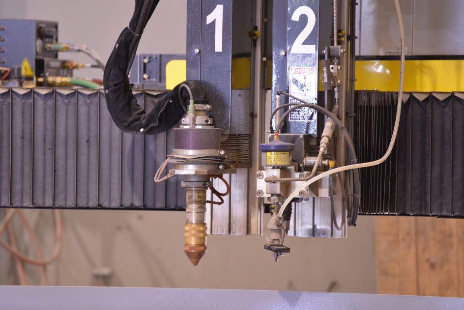 A plasma-waterjet combination machine is not limited to just two cutting heads.
