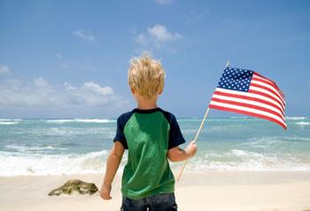 Child holding US flag