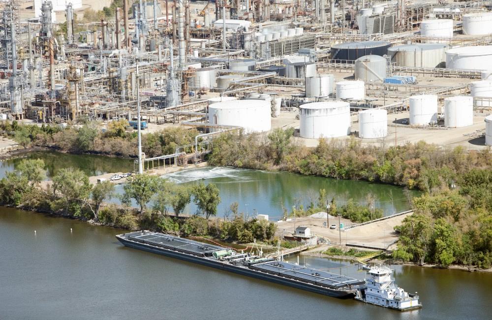 A petrochemical plant along the Mississippi River is shown.