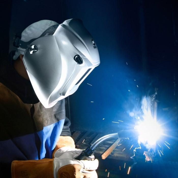 welder welding with gas-shielded flux-cored wires