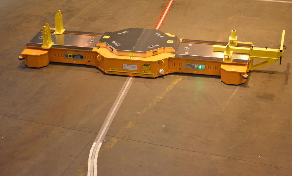 Automatic guided cart follows smart tape that can be repositioned