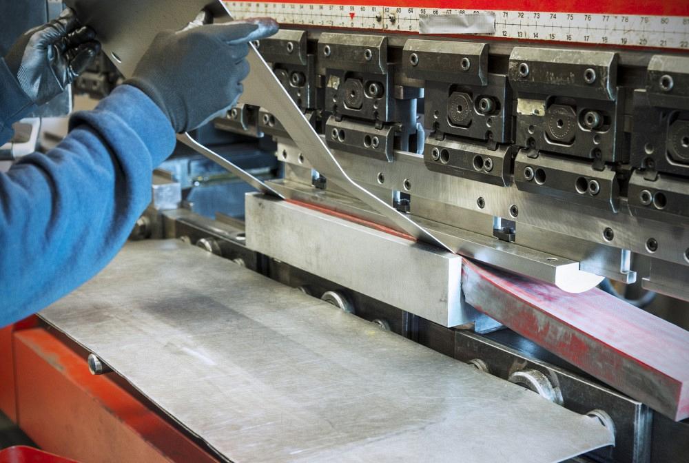 Industrial sheet metal brake press in operation