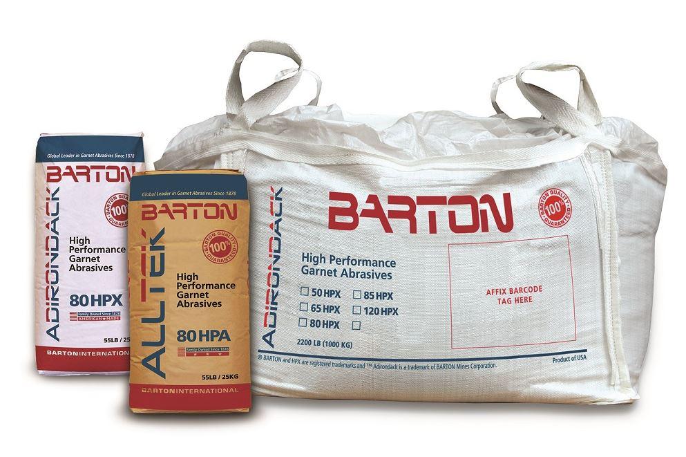 Bags of waterjet abrasive are shown.