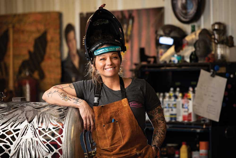 Artist breaking the cycle with welded metal art