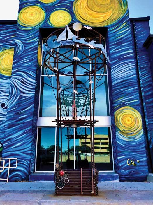 Artist breaking the cycle with welded metal art