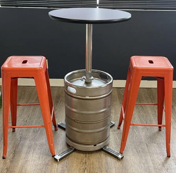 This high-top table has a keg as its base.