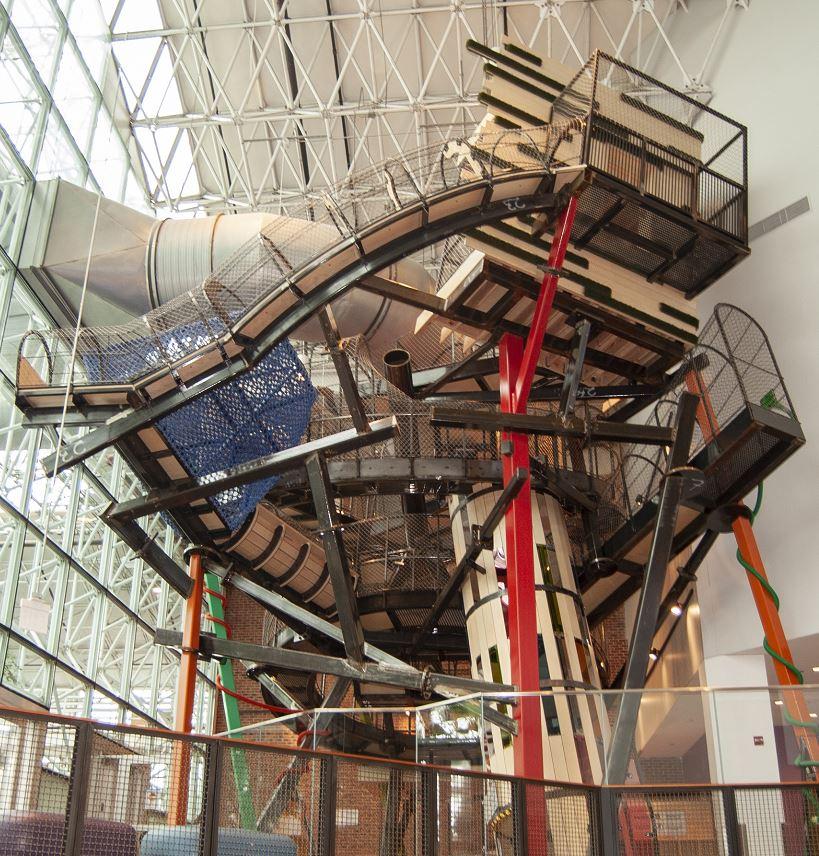 A climbable metal sculpture is shown. 
