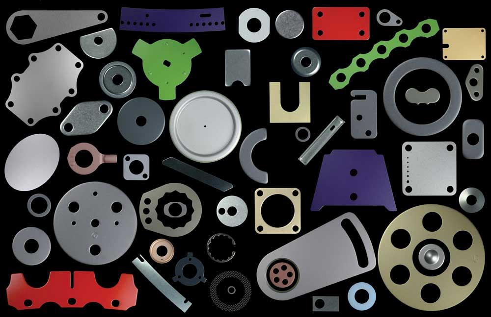 Compound tools stamp precise, thin materials in a complex world