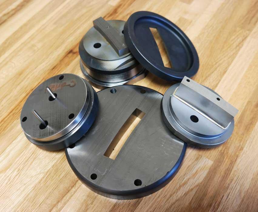 Compound tools stamp precise, thin materials in a complex world