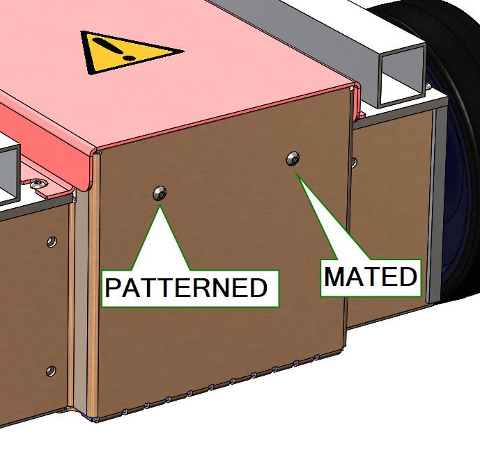 The pattern of holes created by the Hole Wizard is useful for creating a matching pattern of components.