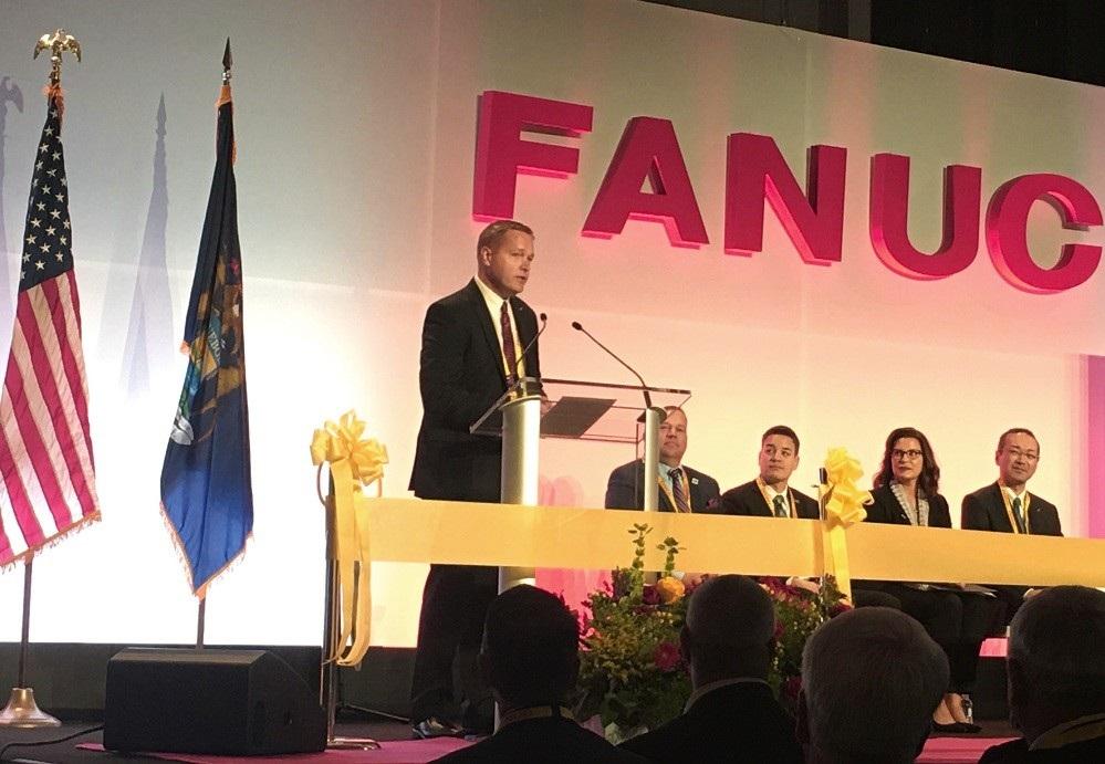 Mike Cicco, president/CEO, FANUC America Corp., speaks to the crowd at new facility.