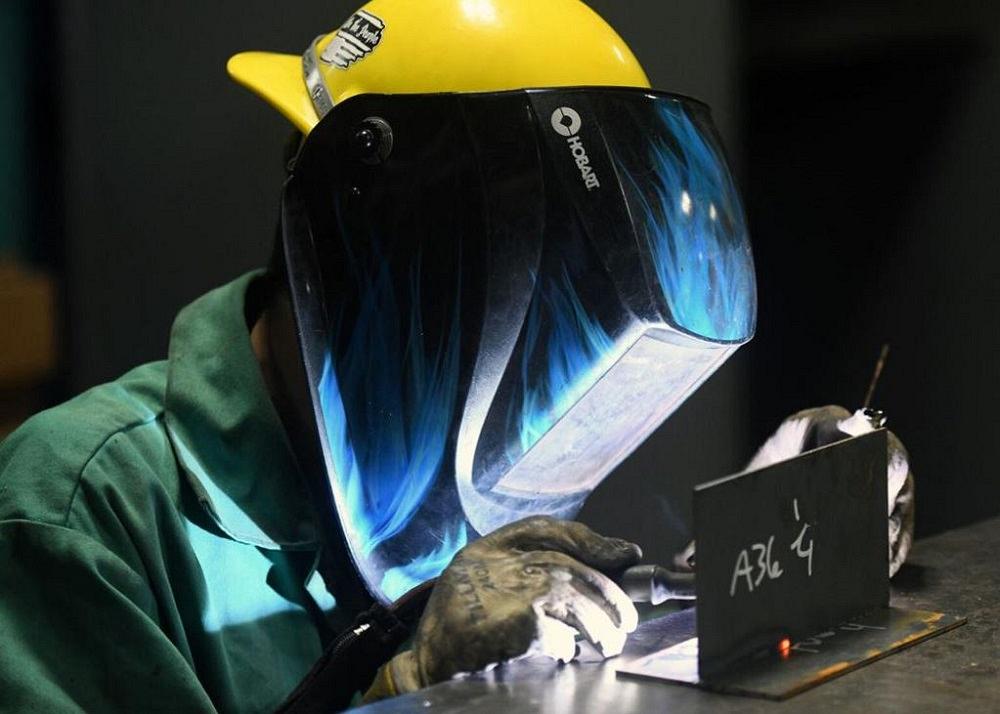 A welder training on different welding methods