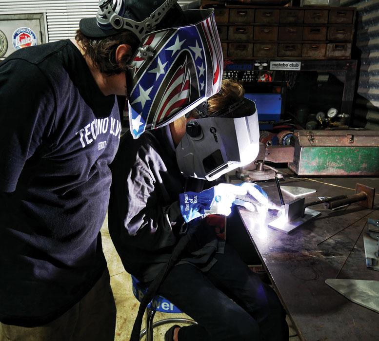 Josh Welton and other welder working on project
