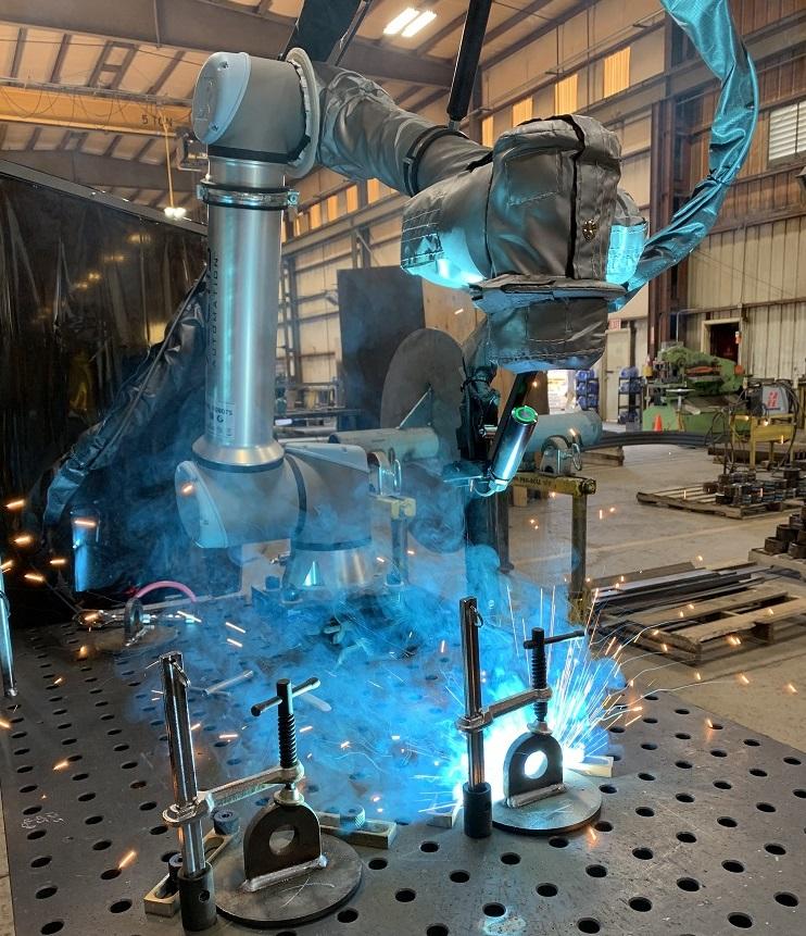 welding cobot in a metal fabrication shop