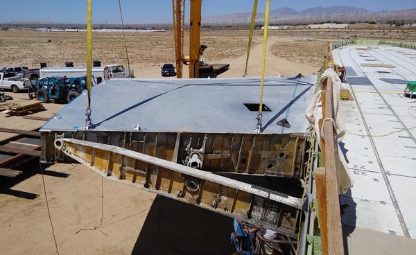 Drilling holes in titanium wing spars for Burning Man festival