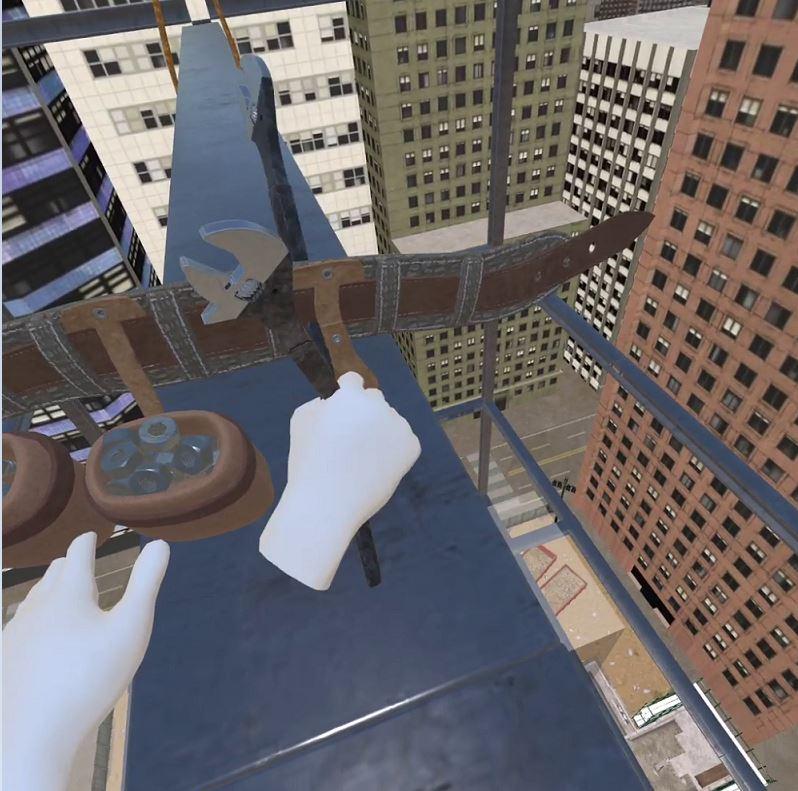 A virtual reality screenshot shows hands performing a bolted connection high on a structure.
