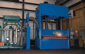 Hydraulic presses perform compression molding
