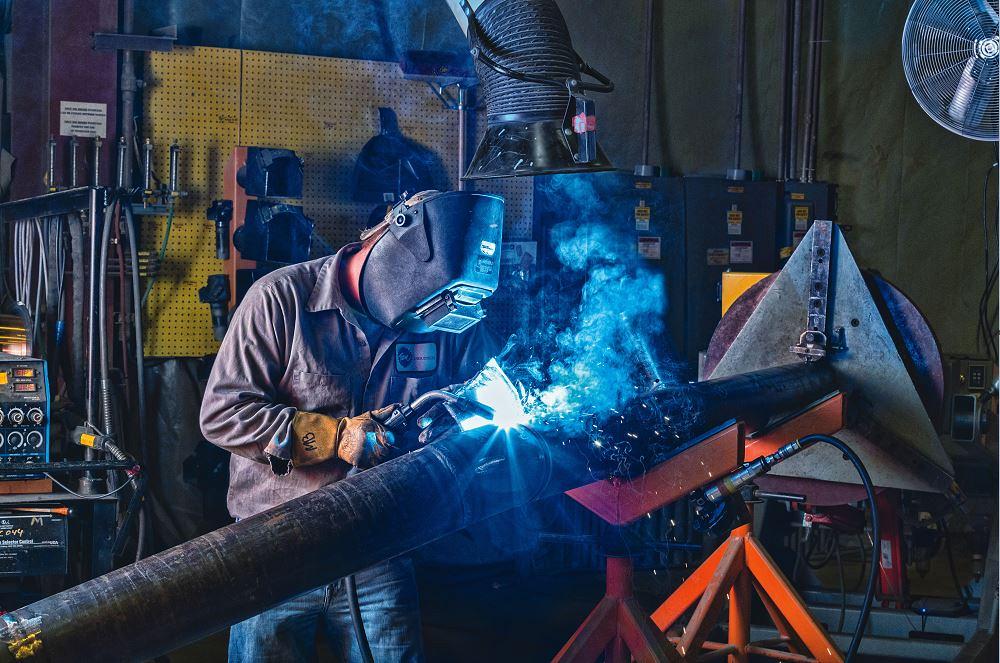 welder in a metal fabrication shop