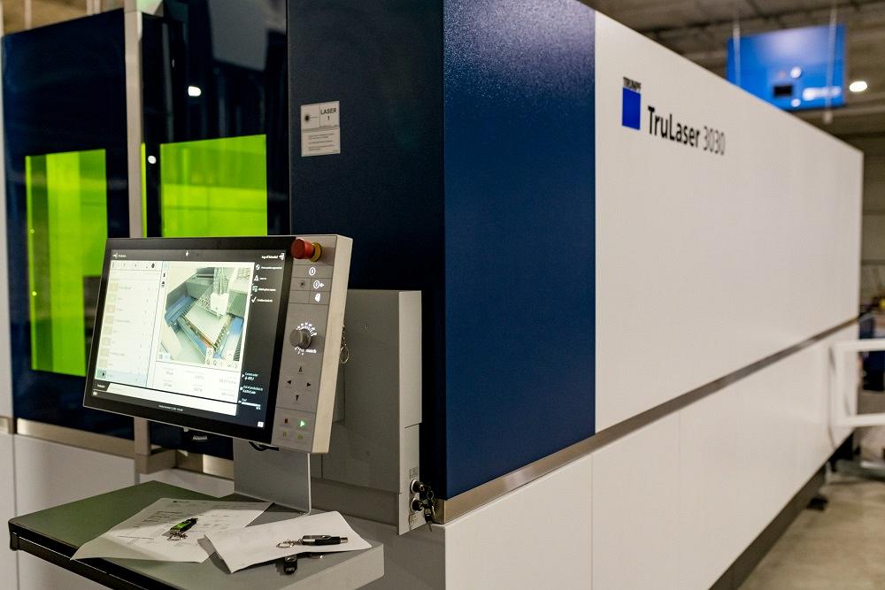 A TRUMPF laser cutting machine is shown.