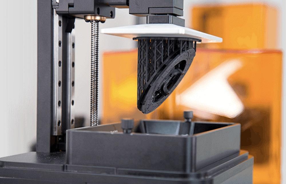 choosing between a fused deposition modeling (FDM) and a stereolithography (SLA) printer