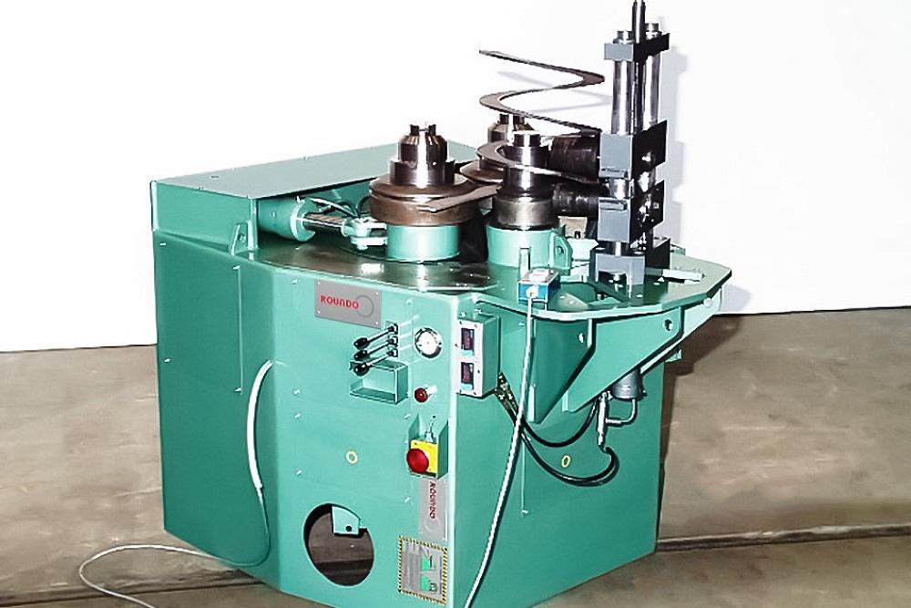 Section bending machines can accommodate other shapes besides round bar. 