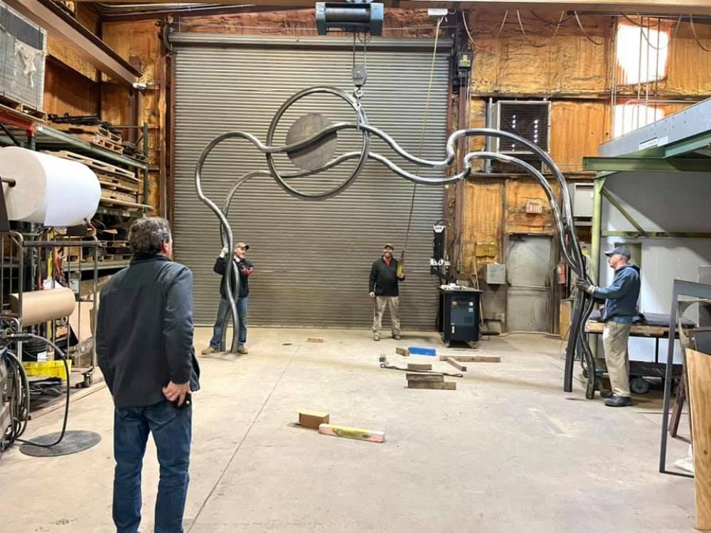 Putting together a metal sculpture