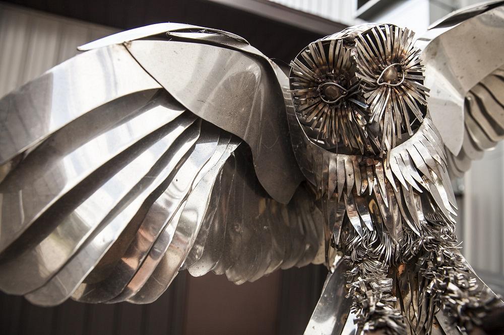 metal sculpture of owl