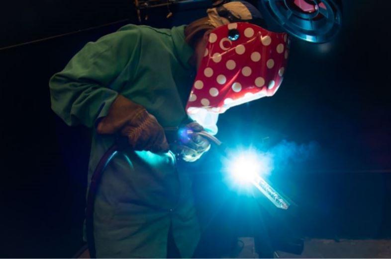 A  student lays down a bead in the new welding lab at South Central College, North Mankato, Minn. 