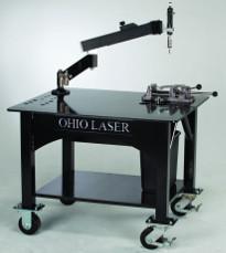 Mobile table designed for use with a tapping arm