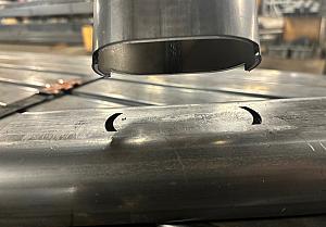 part presentation manufacturing A tube with notches cut out for easier assembly.