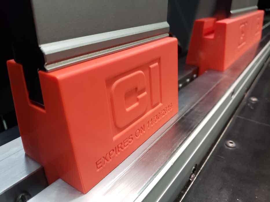 3D printed risers holding dies on a press brake