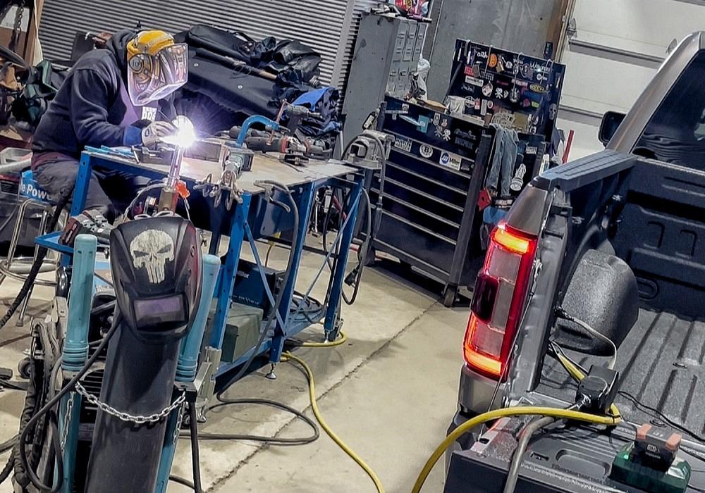 Metal fabricator welding using a the Ford PowerBoost generator