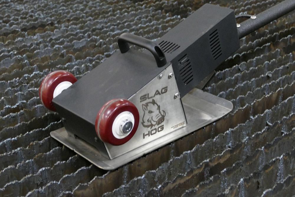 Reducing Headaches Associated With Slag On Laser Grating