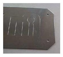Sheet metal with markings is shown.