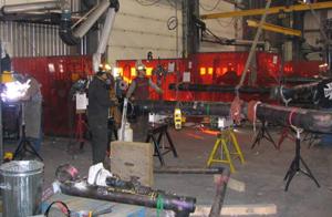 pipe welders map out their welding process