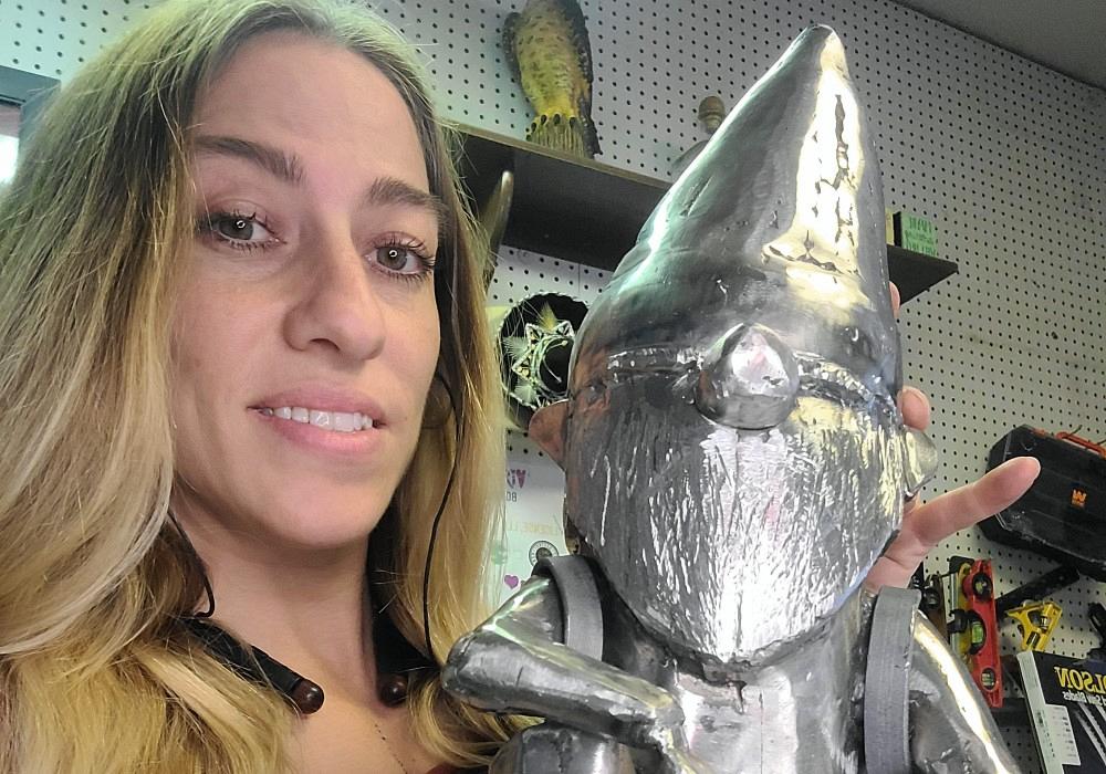 Metal fabricator with a gnome metal sculpture
