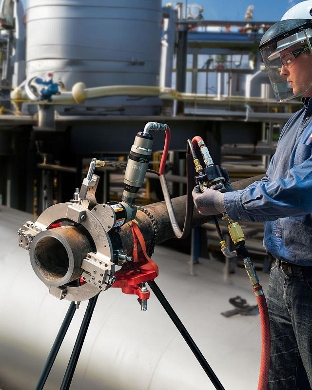 Split-frame pipe cutter mounts squarely on tube and pipe OD