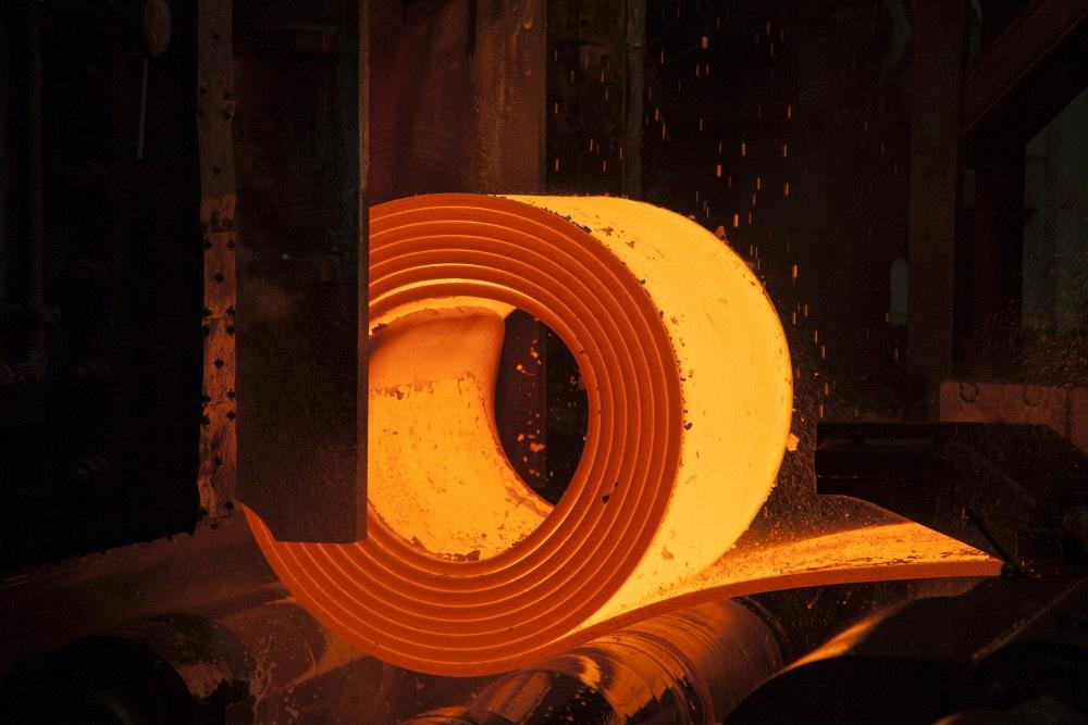 A hot-rolled coil of steel is processed.