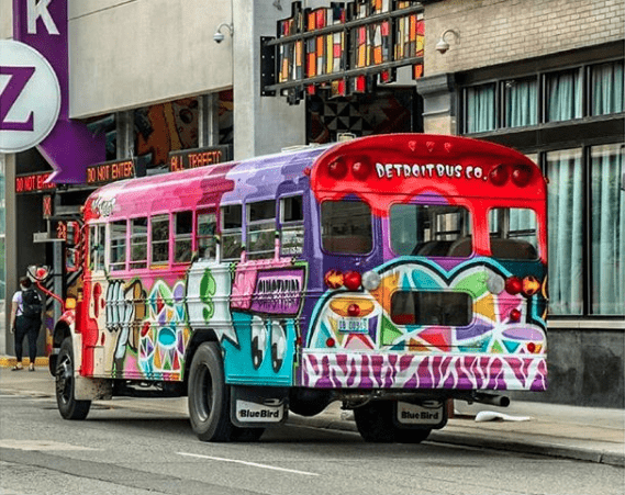 A colorful bus from Detroit Bus Company
