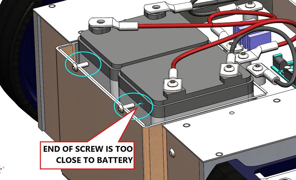 A CAD drawing shows screw tips that are too long for the battery.