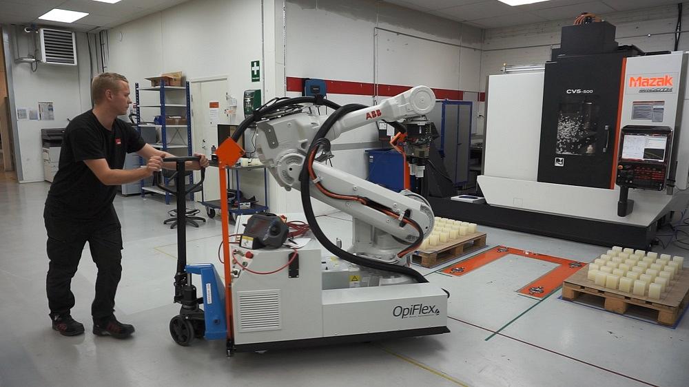 operator moves Flexible mobile robot (FMR) into the docking station