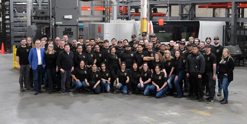 The team at Ludlow Manufacturing Inc. poses for a picture.