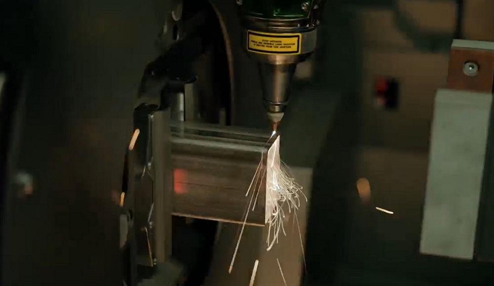 A laser cuts a piece of tubing.
