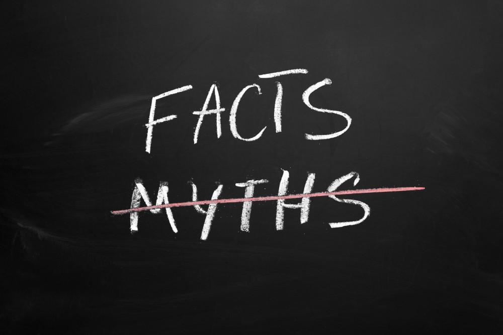 Facts and myths on chalkboard