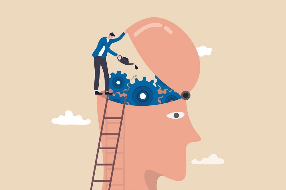 Illustration of businessman helping the mental gears turn