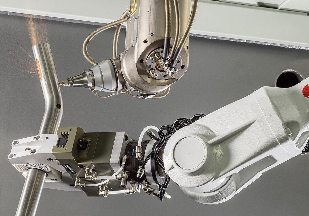 Robotic arm with laser tube cutting techology