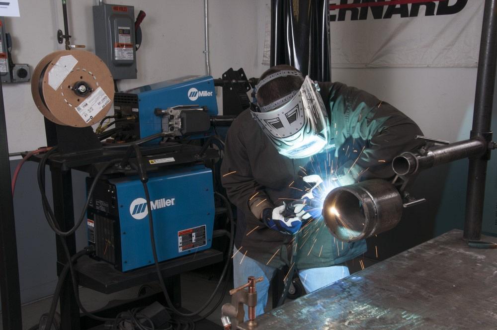 welder working in a metal fabrication shop
