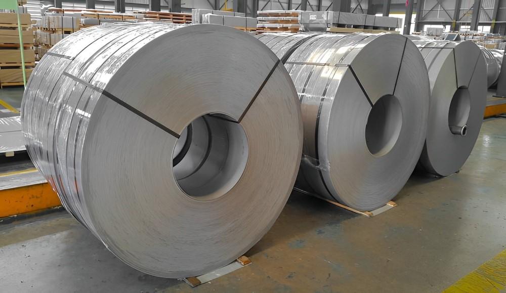 Hot-rolled steel coil straps await shipment.