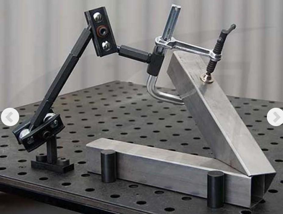 Weld booth A BuildPro articulating arm